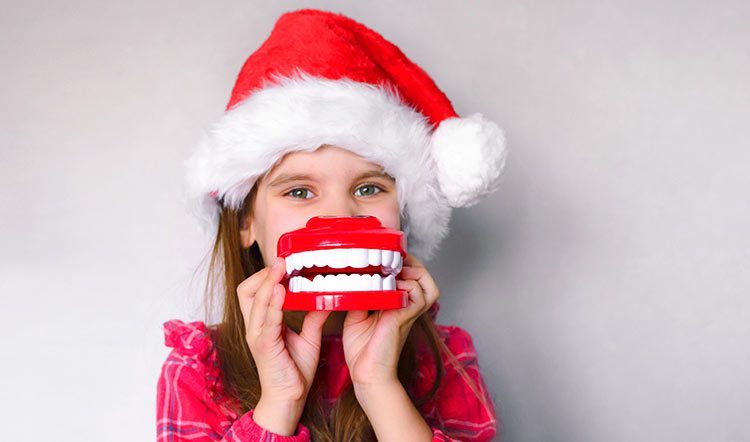 nina-feliz-dientes-navidad